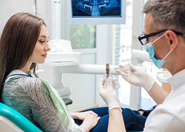 woman having a consultation about dental implants