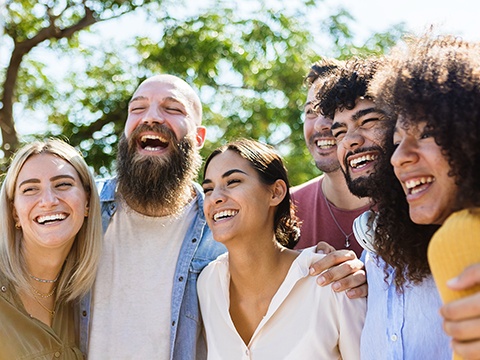 Diverse group of people smiling and laughing