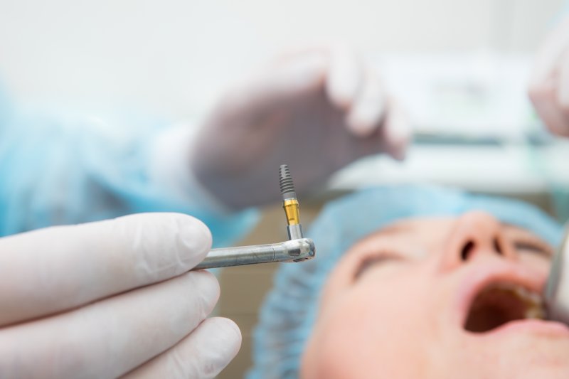 patient undergoing dental implant surgery