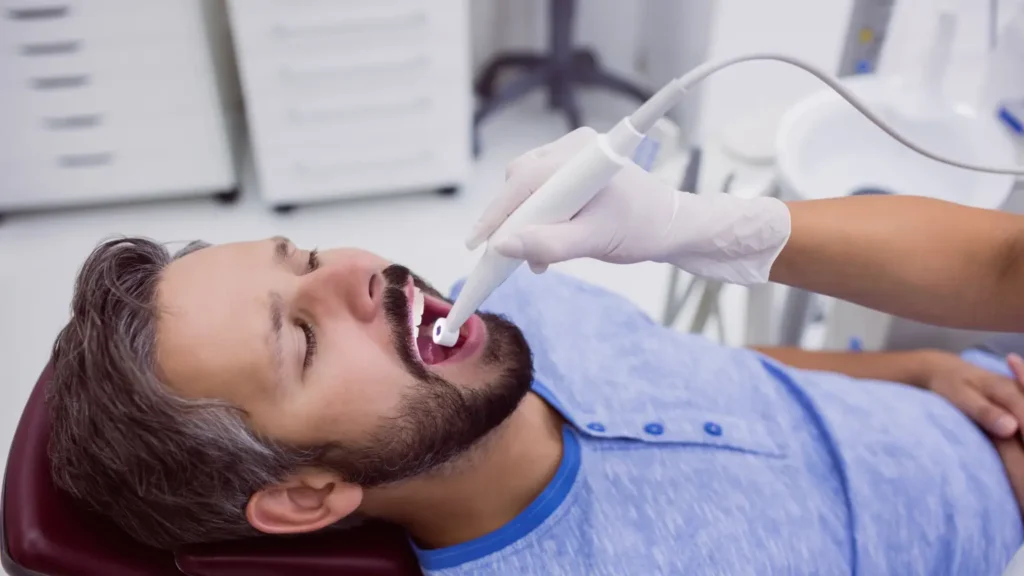 close up patient mouth undergoing dental check up 1 - Dentique Dental Care
