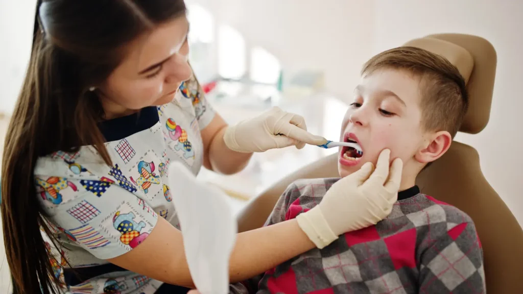 little boy dentist chair children dental 1 - Dentique Dental Care